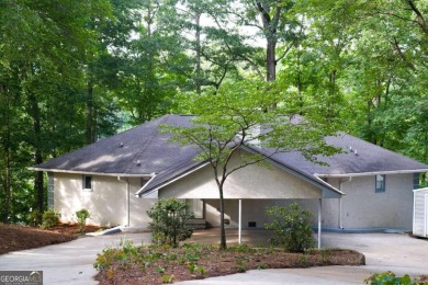 Dive into lakeside luxury at its finest in the heart of Turtle on Turtle Cove Golf Course in Georgia - for sale on GolfHomes.com, golf home, golf lot