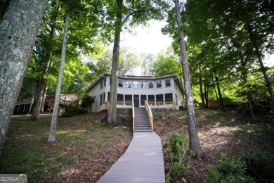 Dive into lakeside luxury at its finest in the heart of Turtle on Turtle Cove Golf Course in Georgia - for sale on GolfHomes.com, golf home, golf lot