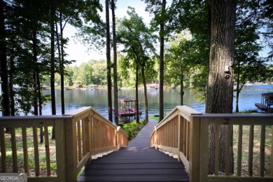 Dive into lakeside luxury at its finest in the heart of Turtle on Turtle Cove Golf Course in Georgia - for sale on GolfHomes.com, golf home, golf lot
