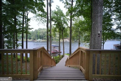 Dive into lakeside luxury at its finest in the heart of Turtle on Turtle Cove Golf Course in Georgia - for sale on GolfHomes.com, golf home, golf lot
