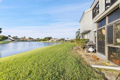 MAJOR PRICE IMPROVEMENT! WILL NOT LAST ...Beautifully maintained on Woodmont Country Club in Florida - for sale on GolfHomes.com, golf home, golf lot