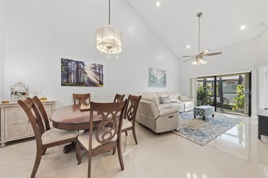 MAJOR PRICE IMPROVEMENT! WILL NOT LAST ...Beautifully maintained on Woodmont Country Club in Florida - for sale on GolfHomes.com, golf home, golf lot