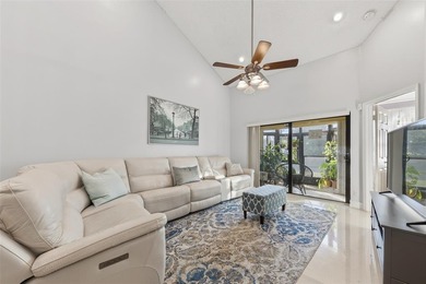 MAJOR PRICE IMPROVEMENT! WILL NOT LAST ...Beautifully maintained on Woodmont Country Club in Florida - for sale on GolfHomes.com, golf home, golf lot