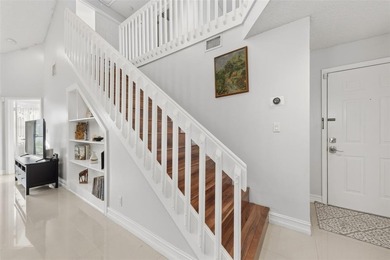 MAJOR PRICE IMPROVEMENT! WILL NOT LAST ...Beautifully maintained on Woodmont Country Club in Florida - for sale on GolfHomes.com, golf home, golf lot