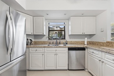 MAJOR PRICE IMPROVEMENT! WILL NOT LAST ...Beautifully maintained on Woodmont Country Club in Florida - for sale on GolfHomes.com, golf home, golf lot