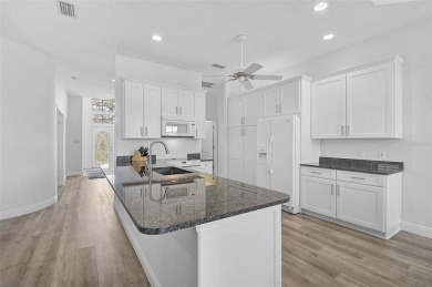 Nestled in the desirable  Falcon Trace, maintenance-free section on Calusa Lakes Golf Club in Florida - for sale on GolfHomes.com, golf home, golf lot