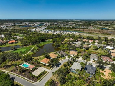 Nestled in the desirable  Falcon Trace, maintenance-free section on Calusa Lakes Golf Club in Florida - for sale on GolfHomes.com, golf home, golf lot