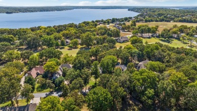 Nestled on the pristine fairway of an exclusive golf course in on The Coves Golf Course in Oklahoma - for sale on GolfHomes.com, golf home, golf lot