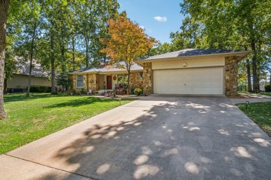 Nestled on the pristine fairway of an exclusive golf course in on The Coves Golf Course in Oklahoma - for sale on GolfHomes.com, golf home, golf lot