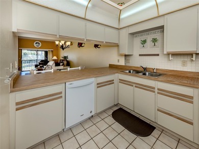 Welcome to this light and airy second-floor condo in desirable on Capri Isle Golf Club in Florida - for sale on GolfHomes.com, golf home, golf lot