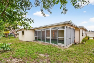 Make this home your own! Popular Grandad model in desirable on Crystal Lake Country Club in Florida - for sale on GolfHomes.com, golf home, golf lot