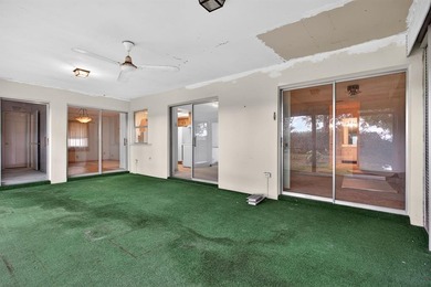 Make this home your own! Popular Grandad model in desirable on Crystal Lake Country Club in Florida - for sale on GolfHomes.com, golf home, golf lot