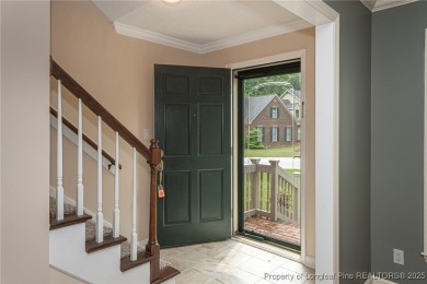 Located in the desirable Kings Grant golf community with no HOA on Kings Grant Golf and Country Club in North Carolina - for sale on GolfHomes.com, golf home, golf lot