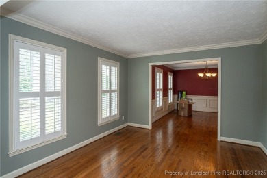 Located in the desirable Kings Grant golf community with no HOA on Kings Grant Golf and Country Club in North Carolina - for sale on GolfHomes.com, golf home, golf lot