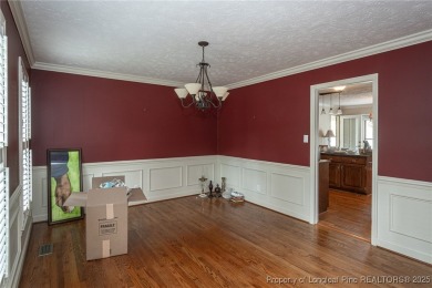 Located in the desirable Kings Grant golf community with no HOA on Kings Grant Golf and Country Club in North Carolina - for sale on GolfHomes.com, golf home, golf lot