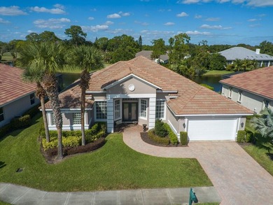 Enjoy spectacular Golf & Water views in the highly sought on The Legacy Golf and Tennis Club in Florida - for sale on GolfHomes.com, golf home, golf lot