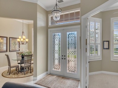 Enjoy spectacular Golf & Water views in the highly sought on The Legacy Golf and Tennis Club in Florida - for sale on GolfHomes.com, golf home, golf lot