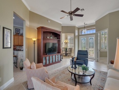 Enjoy spectacular Golf & Water views in the highly sought on The Legacy Golf and Tennis Club in Florida - for sale on GolfHomes.com, golf home, golf lot