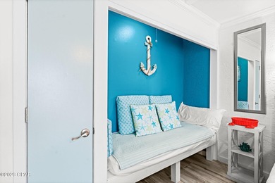 Perched on the top floor of Sugar Beach Condominiums, Unit C21 on Signal Hill Golf Course, Inc. in Florida - for sale on GolfHomes.com, golf home, golf lot