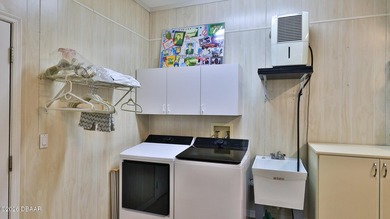 In my opinion, the perfect Wedgewood home in the Spruce Creek on Spruce Creek Golf Club in Florida - for sale on GolfHomes.com, golf home, golf lot