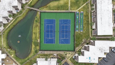 Perched on the top floor of Sugar Beach Condominiums, Unit C21 on Signal Hill Golf Course, Inc. in Florida - for sale on GolfHomes.com, golf home, golf lot