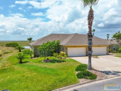 Rare opportunity! One of the few 3-bedroom villas with a larger on South Padre Island Golf Club in Texas - for sale on GolfHomes.com, golf home, golf lot
