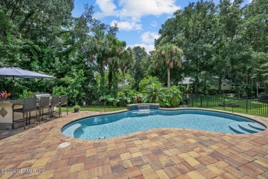 Discover your dream home in the exclusive Queens Harbour Yacht & on Queens Harbour Yacht and Country Club in Florida - for sale on GolfHomes.com, golf home, golf lot