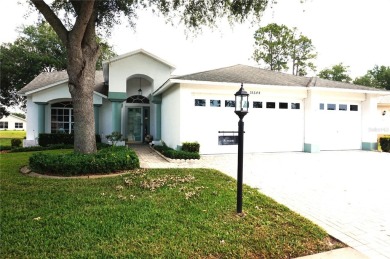 This Tamarack Model home with its open floor plan has not only a on Heritage Pines Country Club in Florida - for sale on GolfHomes.com, golf home, golf lot