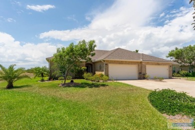 Rare opportunity! One of the few 3-bedroom villas with a larger on South Padre Island Golf Club in Texas - for sale on GolfHomes.com, golf home, golf lot