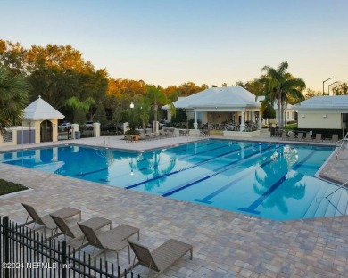 Discover your dream home in the exclusive Queens Harbour Yacht & on Queens Harbour Yacht and Country Club in Florida - for sale on GolfHomes.com, golf home, golf lot