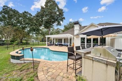 Discover your dream home in the exclusive Queens Harbour Yacht & on Queens Harbour Yacht and Country Club in Florida - for sale on GolfHomes.com, golf home, golf lot