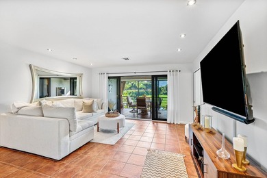 Enjoy stunning lake and golf course vistas from this on Quail Ridge Golf Course and Country Club in Florida - for sale on GolfHomes.com, golf home, golf lot