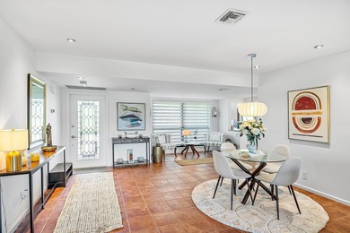 Enjoy stunning lake and golf course vistas from this on Quail Ridge Golf Course and Country Club in Florida - for sale on GolfHomes.com, golf home, golf lot