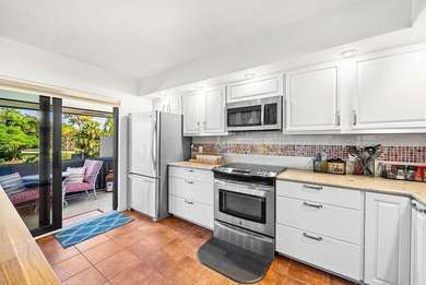 Enjoy stunning lake and golf course vistas from this on Quail Ridge Golf Course and Country Club in Florida - for sale on GolfHomes.com, golf home, golf lot