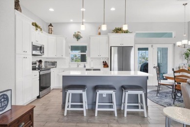 Discover the perfect blend of elegance, comfort, and Florida on Pinemoor West Golf Club in Florida - for sale on GolfHomes.com, golf home, golf lot