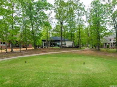 STUNNING ONE-LEVEL GOLF COURSE HOME OVERLOOKING THE #3 TEE BOX on Isabella Golf Course  in Arkansas - for sale on GolfHomes.com, golf home, golf lot