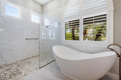 Luxurious Single-Family Estate in Quail West with NEW ROOF just on Quail West Golf and Country Club in Florida - for sale on GolfHomes.com, golf home, golf lot