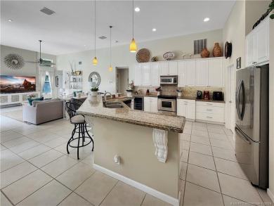 MOVE IN READY with a 2022 Roof - Updated 4 BR, 3 bath, 3 car on Hammock Creek Golf Club in Florida - for sale on GolfHomes.com, golf home, golf lot