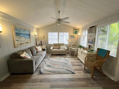 This beautifully updated 2bd, 2ba home is situated on a private on Del Tura Golf and Country Club in Florida - for sale on GolfHomes.com, golf home, golf lot