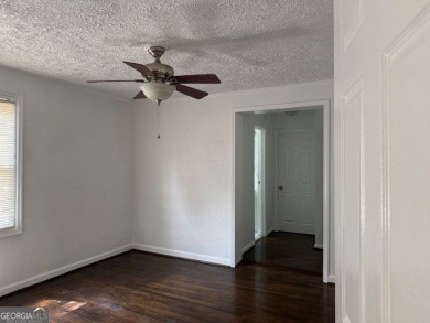 East Atlanta Deal:  This four side brick single family house was on East Lake Golf Club in Georgia - for sale on GolfHomes.com, golf home, golf lot
