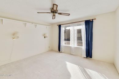 Step into desert charm and serene community living in this on Fountain of the Sun Country Club in Arizona - for sale on GolfHomes.com, golf home, golf lot