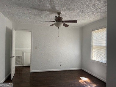 East Atlanta Deal:  This four side brick single family house was on East Lake Golf Club in Georgia - for sale on GolfHomes.com, golf home, golf lot