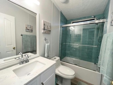 This beautifully updated 2bd, 2ba home is situated on a private on Del Tura Golf and Country Club in Florida - for sale on GolfHomes.com, golf home, golf lot