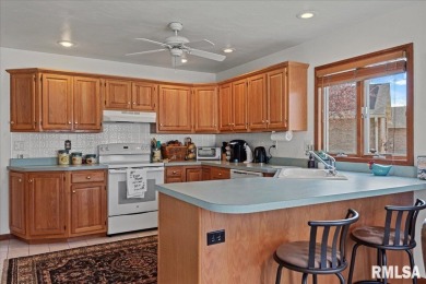 This absolute GEM of a home is located in the desirable Panther on Panther Creek Country Club in Illinois - for sale on GolfHomes.com, golf home, golf lot