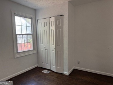 East Atlanta Deal:  This four side brick single family house was on East Lake Golf Club in Georgia - for sale on GolfHomes.com, golf home, golf lot