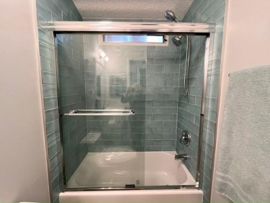 This beautifully updated 2bd, 2ba home is situated on a private on Del Tura Golf and Country Club in Florida - for sale on GolfHomes.com, golf home, golf lot