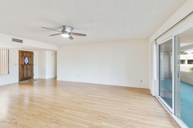 Step into desert charm and serene community living in this on Fountain of the Sun Country Club in Arizona - for sale on GolfHomes.com, golf home, golf lot