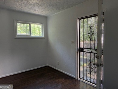 East Atlanta Deal:  This four side brick single family house was on East Lake Golf Club in Georgia - for sale on GolfHomes.com, golf home, golf lot