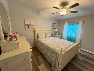 This beautifully updated 2bd, 2ba home is situated on a private on Del Tura Golf and Country Club in Florida - for sale on GolfHomes.com, golf home, golf lot