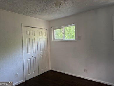 East Atlanta Deal:  This four side brick single family house was on East Lake Golf Club in Georgia - for sale on GolfHomes.com, golf home, golf lot